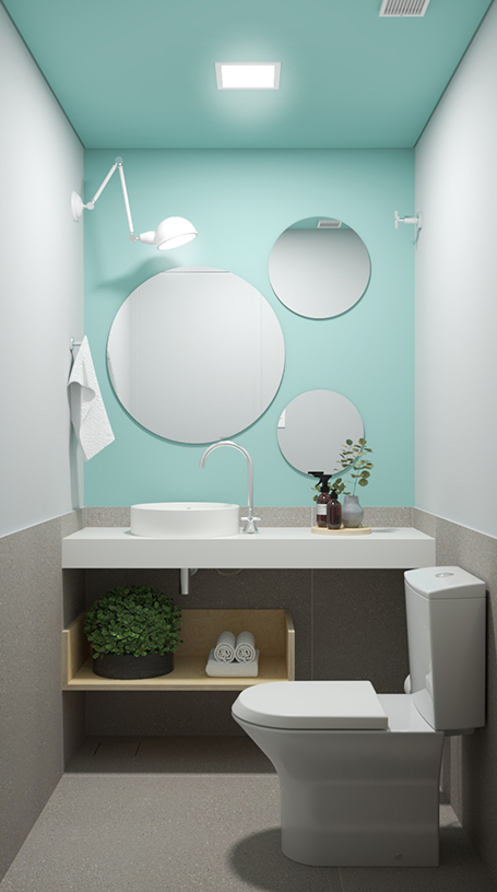 lavabo de projeto de escritório com parede cor Paz Interior da Coral espelho redondo bancada branca e porcelanato cinza nas paredes