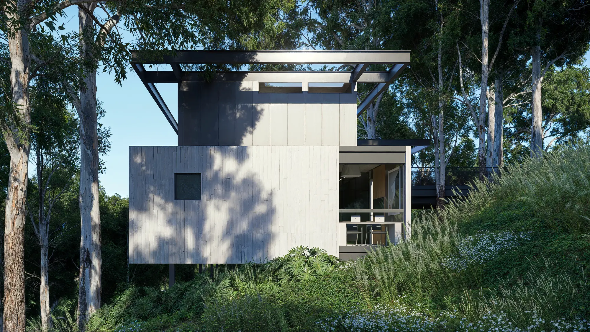 Casa suspensa em estrutura metálica Casa suspensa em estrutura metálica implantada em terreno arborizado