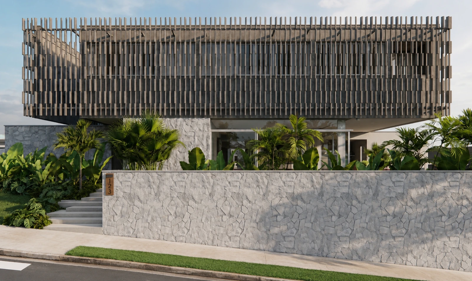 Fachada contemporânea da Casa Lerach em Jundiaí com brises verticais, revestimento em pedra clara e paisagismo tropical.